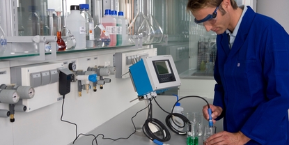 Employee in the laboratory performing calibration