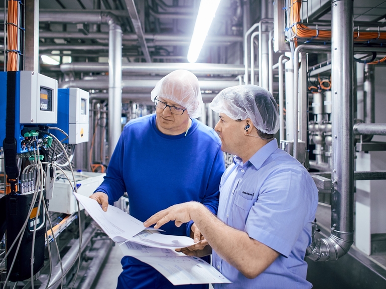Our calibration experts optimizing a dairy plant Calibration experts at work in a dairy